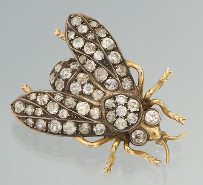 A Ladies Gold Silver and Diamond Fly