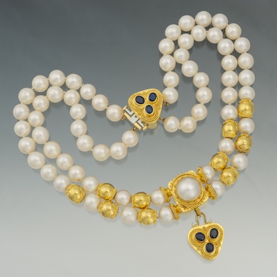 An Impressive 22k Gold 9MM Pearl and