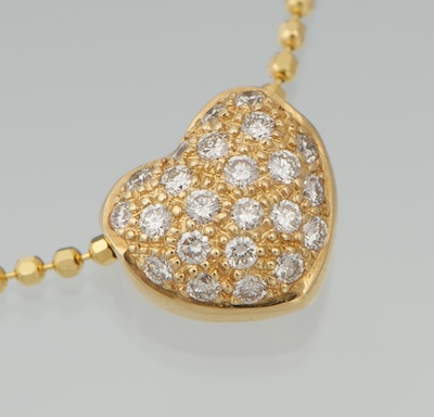 A Ladies Diamond Heart Pendant on Chain