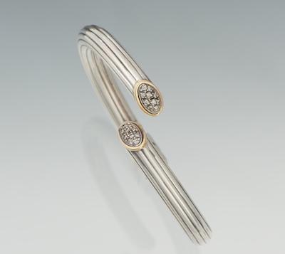 A Sterling Silver and Diamond Bangle