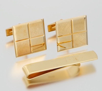 A Pair of 14k Gold Cufflinks and Tie