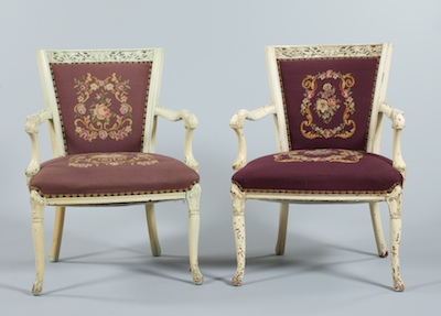 A Pair of Carved and Painted Arm Chairs