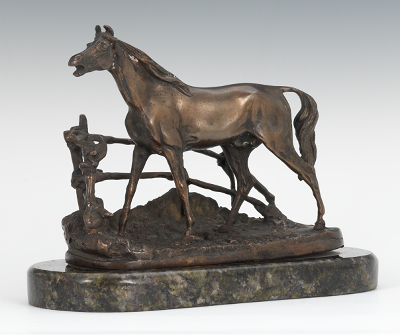 A Cast Metal Statuette of a Horse after