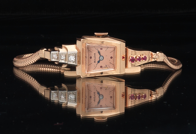 A Retro Bulova Pink Gold and Gemstone