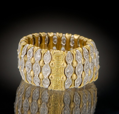 A Ladies Flexible 18k Gold and 13313c