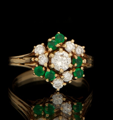 A Ladies Diamond and Emerald Ring 133157