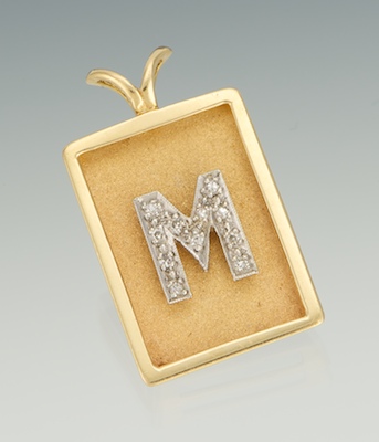 A Ladies Diamond M Initial Pendant 133167