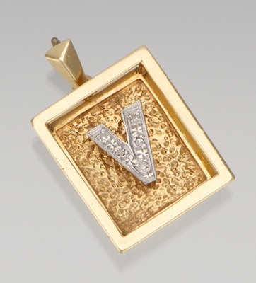 A Gold and Diamond Initial Pendant 133168