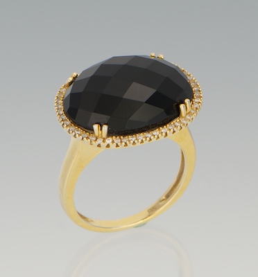 A Ladies Onyx and Diamond Ring 13317a