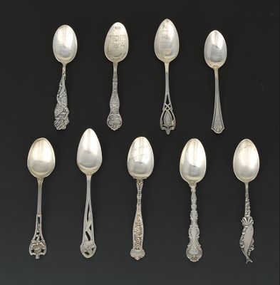 A Collection of Silver Spoons Each of