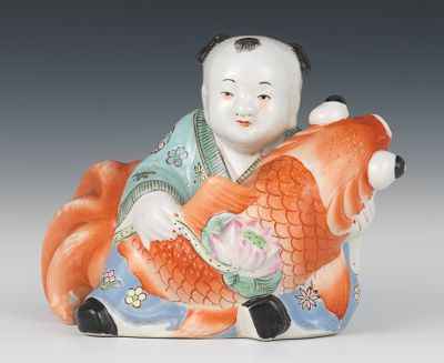 Ceramic Sculpture of Child with Fish