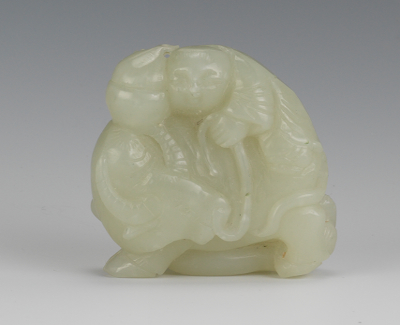 A Carved Jade Ornament of a Boy