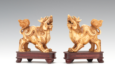 A Pair of Ivory Foo Lions A pair of
