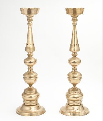 A Pair of Brass Candle Prickets Tall