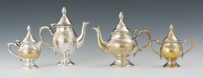 A Silver Plated Dolls Tea Service Including:
