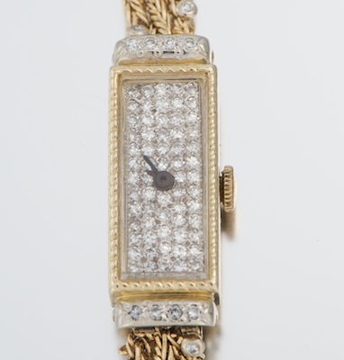 A Ladies Gold and Diamond Dress Watch