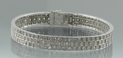 A Ladies' 18k Gold and Diamond