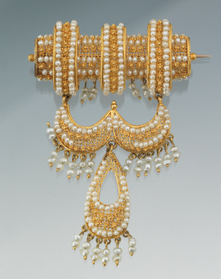 An Etruscan Style Gold Plated Filigree