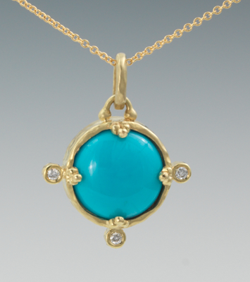 A Ladies' Blue Cabochon and Diamond