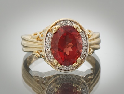 A Ladies' Orange Garnet and Diamond