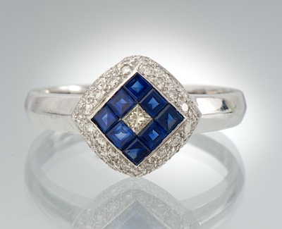 A Ladies Diamond and Sapphire Ring