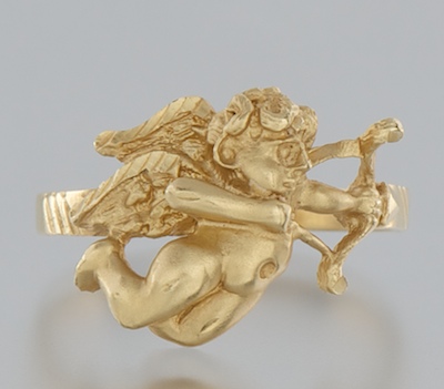 A Ladies' Gold Cupid Design Ring