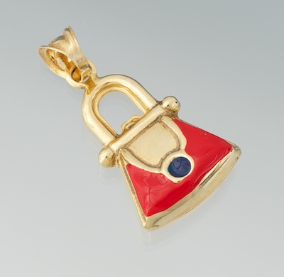 A Gold and Enamel Purse Charm 14k