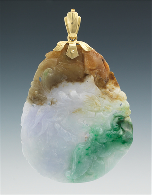 A Large Carved Jadeite Pendant 133582