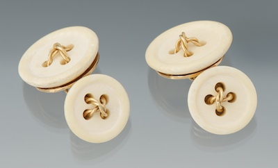 A Pair of Charming Ivory and Gold Button