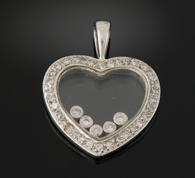 A Ladies Diamond Heart Pendant 1335e9