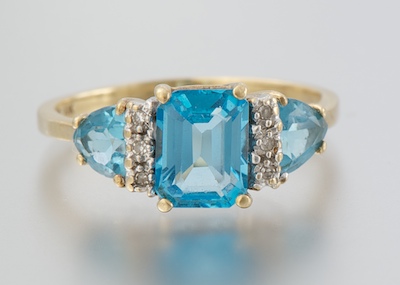 A Ladies' Topaz and Diamond Ring