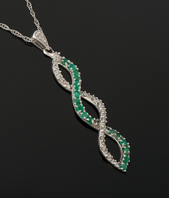 A Ladies Emerald and Diamond Pendant 133615