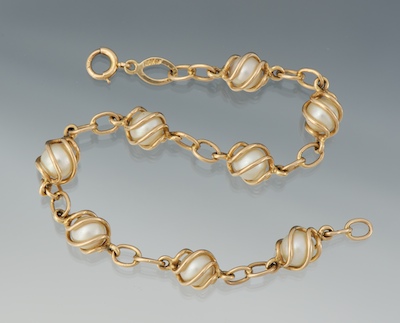 A Ladies' Gold and Pearl Bracelet