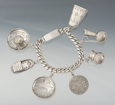 A Mexican Sterling Silver Charm Bracelet