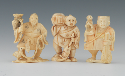 A Group of Two Carved Ivory Netsuke