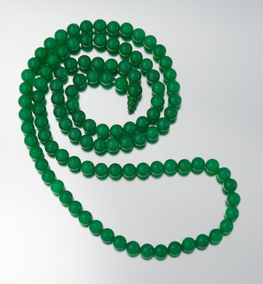A Long Jadeite Bead Necklace Individually 13372d