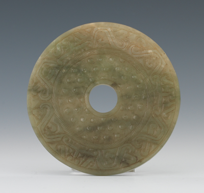 A Chinese Carved Jade Bi Disk Olive 133733