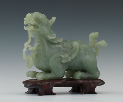 A Carved Celadon Green Jade Dragon 133737