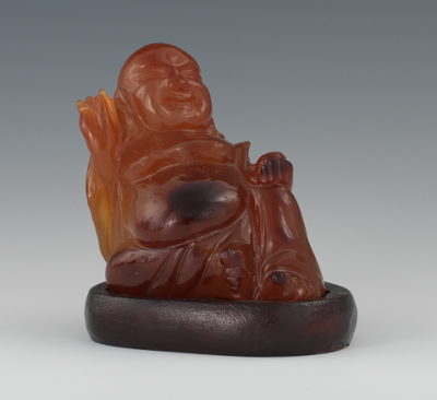 A Chinese Carved Agate Buddha Depicted