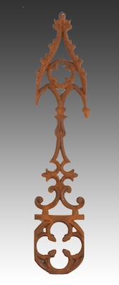 A Cast Iron Ornament With Gothic