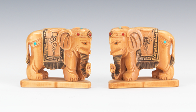 A Pair of Carved Ivory Elephant Figurines