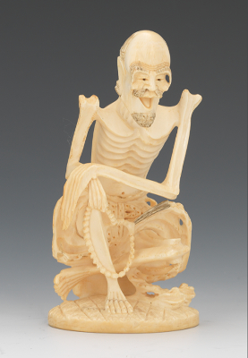 Japanese Ivory Acetic Figurine A very