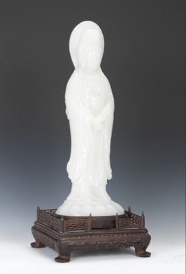 A Carved White Jade Quan Yin with 131a58