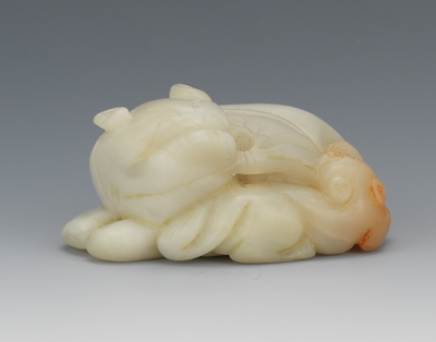 A Carved Jade Lion and Cub Ornament 131a59