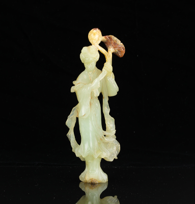 A Carved Nephrite Quan Yin Figurine