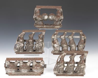 A Group of Antique Chocolate Molds Including: