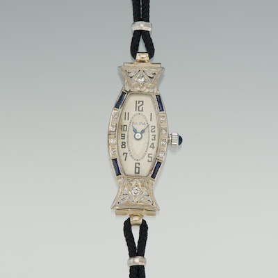 An Art Deco Bulova Gold Watch 18k white