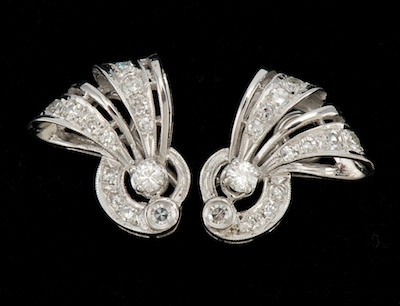 A Pair of Diamond Earrings 14k