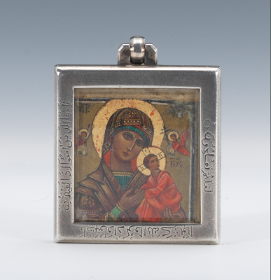 A Miniature Russian Icon Set in a Silver