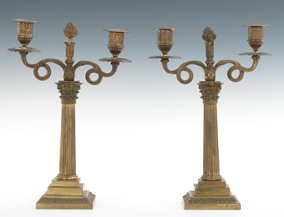 A Pair of Cast Brass Candle Holders